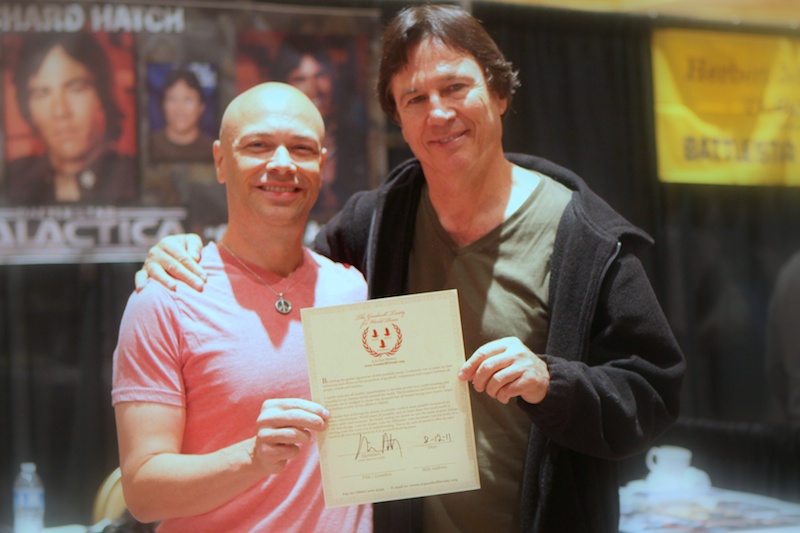 Bryant and Actor Richard Hatch after signing the Goodwill Treaty.