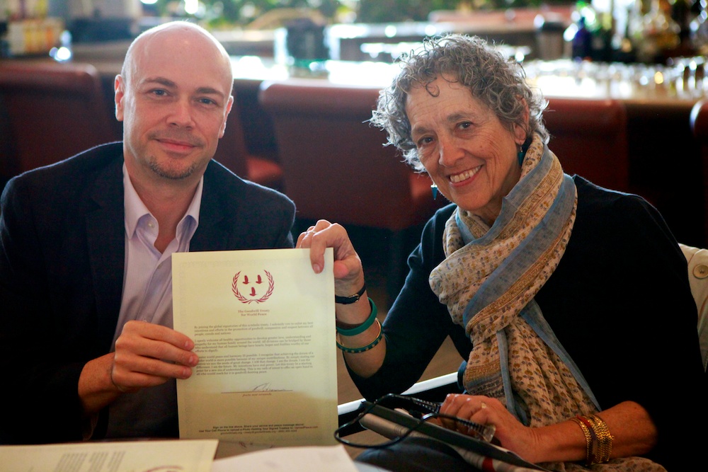 Bryant McGill and Ruth Messinger of American Jewish World Services Signing the Goodwill Treaty